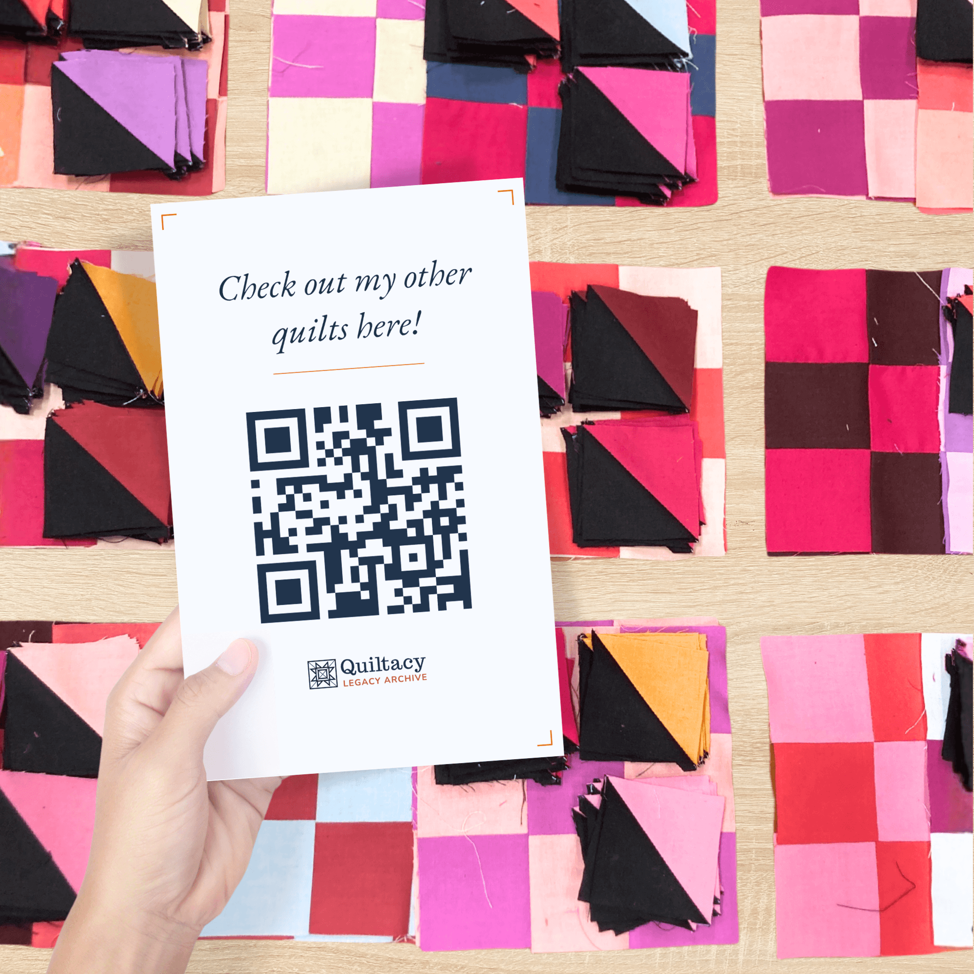 QR code sign held at a quilt retreat